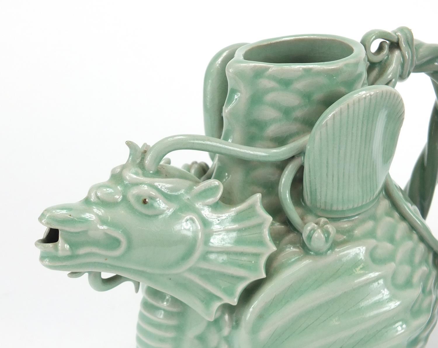 Chinese celadon glazed teapot and a blue and white porcelain bottle vase with cover, the largest - Image 2 of 6