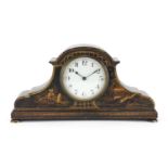 Black lacquered mantel clock gilded in the chinoiserie manner, the enamelled dial with Arabic