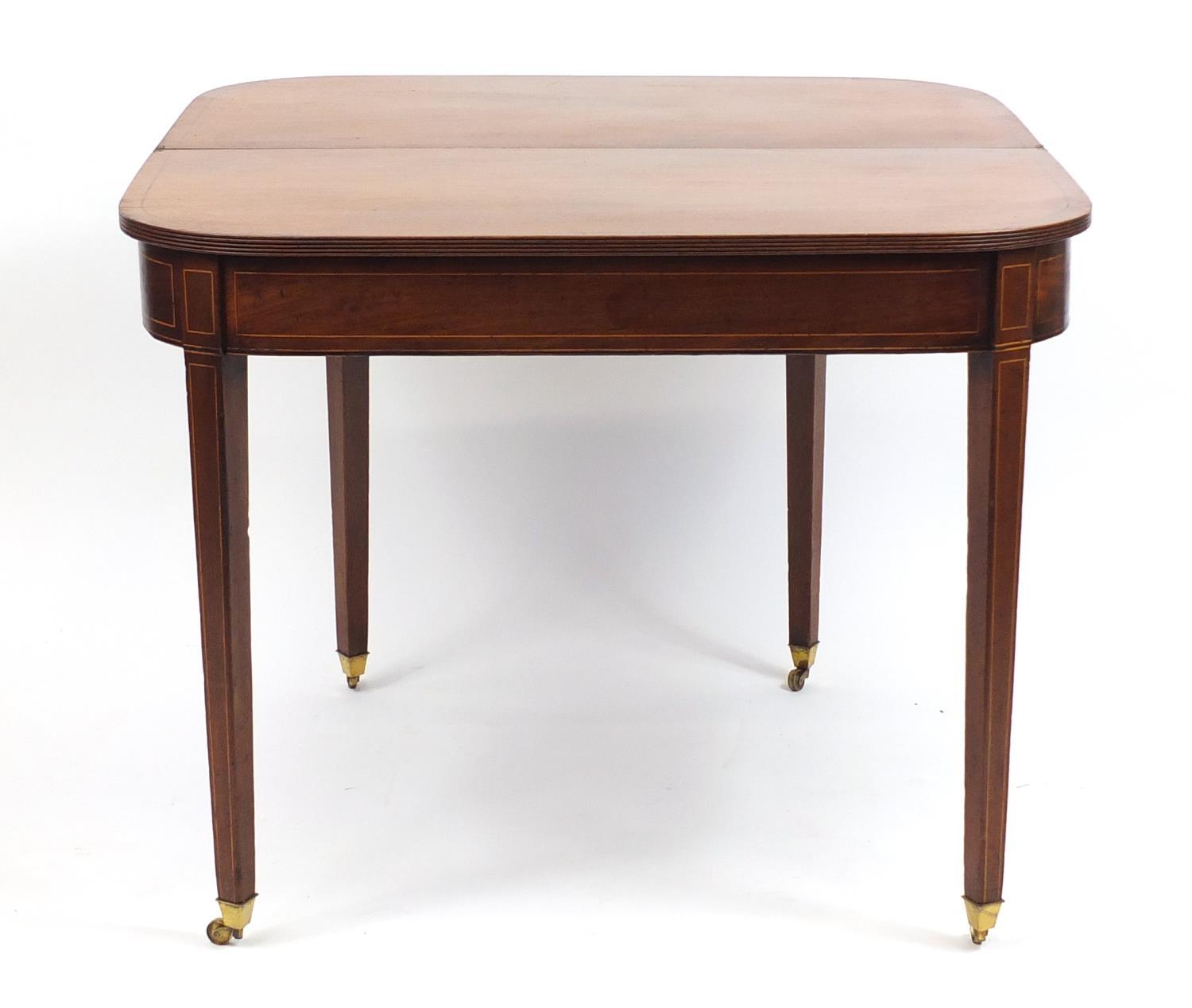 Edwardian inlaid mahogany fold over tea table, raised on tapering legs, 72cm H x 91cm W x 45cm D ( - Image 2 of 4