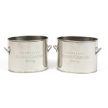 Pair of Alfred Gratien champagne ice buckets with twin handles, each 24cm wide excluding the handles