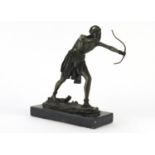 Patinated bronze figure of an African tribesman with a bow, raised on a rectangular black marble