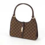 Vintage Gucci monogramed handbag with dust bag, 26.5cm wide : For Further Condition Reports Visit