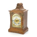 Burr walnut cased bracket clock, with gilt brass mounts striking on two gongs, the ornate face