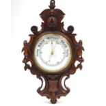 Victorian walnut wall barometer carved with leaves and berries, 58cm high : For Further Condition