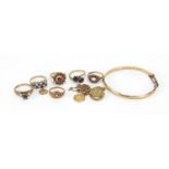 Mostly gold jewellery including four 9ct gold rings, St Christopher pendants, unmarked gold garnet