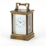 Large brass cased repeating carriage clock striking on a gong by Matthew Norman, the enamelled