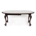 Chippendale style mahogany D end wind out dining table with ball and claw feet, 74cm H x 174cm W (