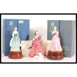 A collection of three Royal Doulton figurines to include Lady Dianna Spencer HN 2885 raised on socle