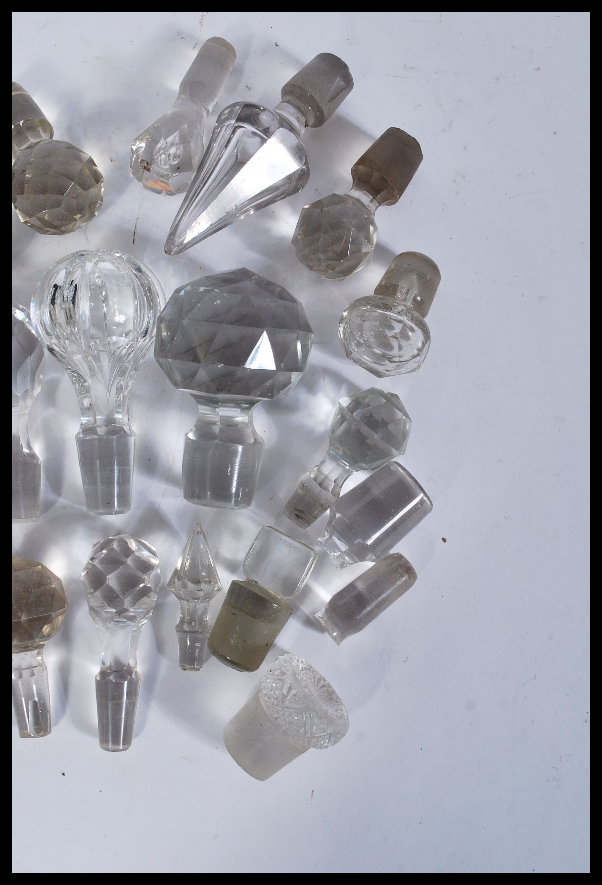 A collection of glass decanter / bottle stoppers of various forms most being crystal cut glass - Image 4 of 4
