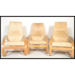 A set of three 20th century / contemporary Danish bentwood cantilever armchairs easy chairs in the