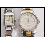 Two ladies watches to include a Skagen Denmark wrist watch having a white enamelled face with gold