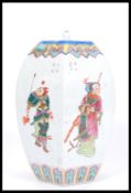 A 19th century Chinese jar vase and cover of hexagonal having hand painted white cartouche panels