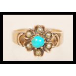 A Victorian gold turquoise and seed pearl flower cluster ring. Unmarked tests gold. Size K.5. Weight