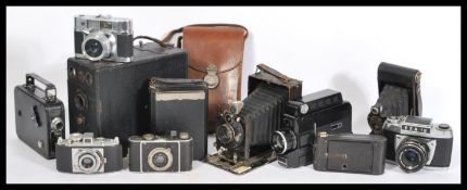 A selection of vintage film cameras to include Meyer-Optik Domiplan 50mm, a Kodak vest Pocket