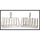 A pair of early 20th Century silver plated toast racks by Howson Brothers of graduating