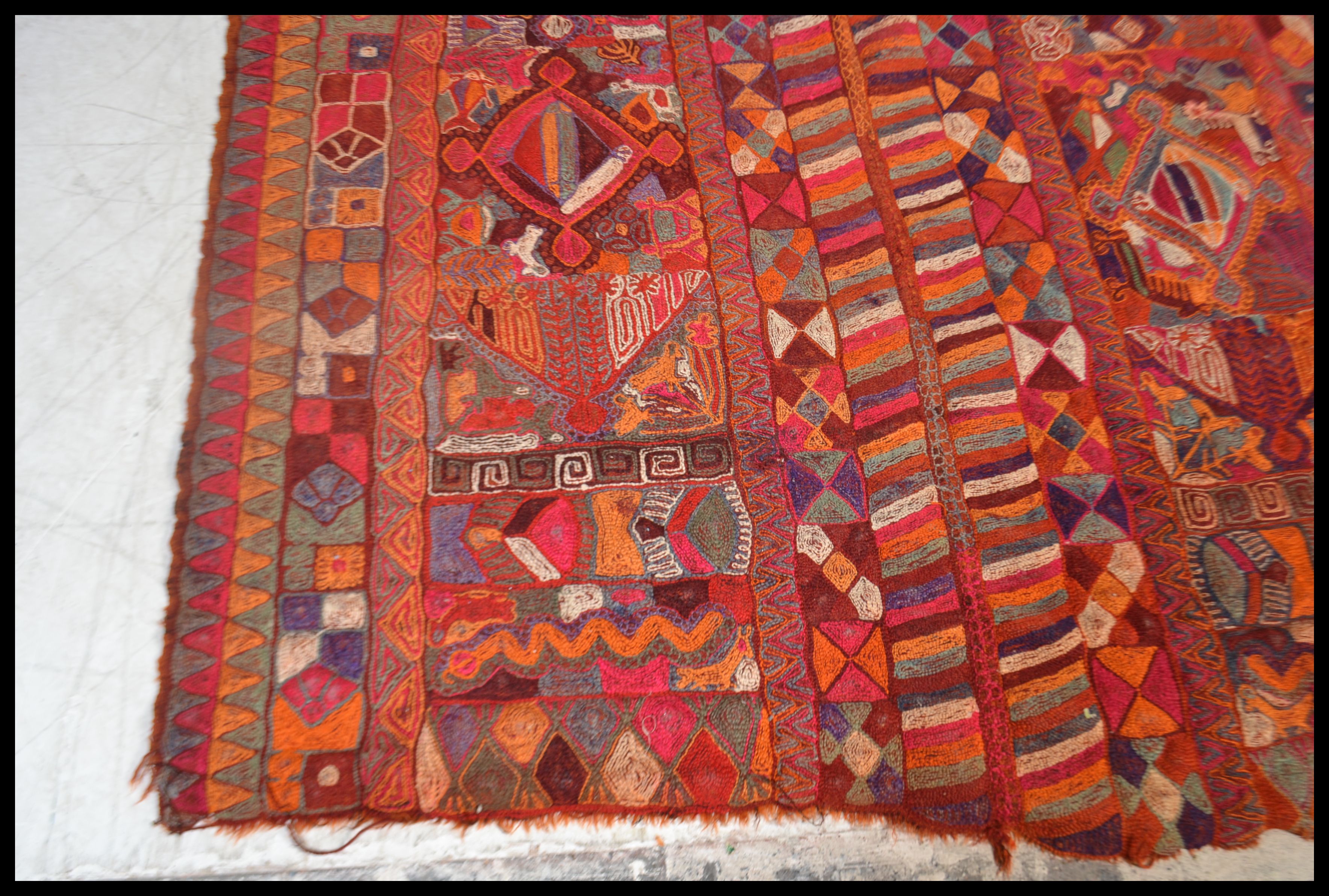 A  stunning large ethnic tribal carpet rug of handwoven bright vivid form, constructed from - Image 3 of 4