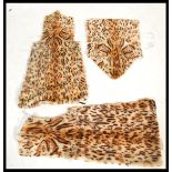 Three sheep skin rugs / throws being printed with rosettes to resemble wild cat skins.