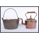 A 19th Century Victorian brass and copper kettle together with a similar aged brass and copper