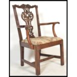 An 18th / early 19th century Chippendale carver desk / office chair having well proportioned and