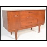 A vintage retro 20th Century Danish influenced teak wood sideboard / credenza of small