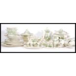 A collection of Masons ' Fruit Basket ' ceramics - dinner and tea service comprising teapot, cups,