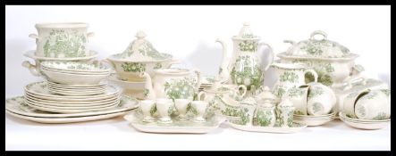 A collection of Masons ' Fruit Basket ' ceramics - dinner and tea service comprising teapot, cups,