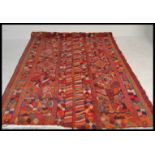 A  stunning large ethnic tribal carpet rug of handwoven bright vivid form, constructed from