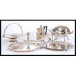 A good collection of silver plated wares to include serving trays, muffin warmer, coffee pot,