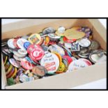 A collection of vintage advertising badges from the mid to late 20th Century to include Coca cola,