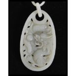 A Chinese hand carved Devil's Work jade necklace and pendant of long form with large panel pendant