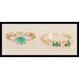 Two hallmarked 9ct gold emerald and diamond rings one having a central oval mixed cut emerald
