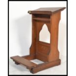 A mid 20th century golden ecclesiastical oak lectern - reading stand. The sloped top over column and