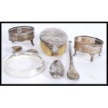 A selection of silver hallmarked items to include a pair of Georgian silver condiments with engraved