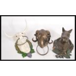 A collection of 3x Farm Animal themed towel holders / dog ties. All wall mountable, of cast iron