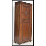 A good quality Jacobean Revival oak sentry box hall cupboard / wardrobe. Plinth base with full