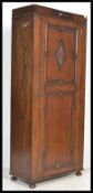 A good quality Jacobean Revival oak sentry box hall cupboard / wardrobe. Plinth base with full