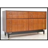 G Plan Ernst Gomme for G Plan Tola wood / teak wood chest of drawers, a double bank of four drawers,
