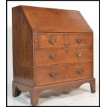 An 18th century Georgian oak bureau having a fall front with fully appointed interior. Two over