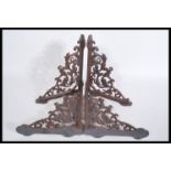 A set of 4x cast iron Victorian style architectural wall / shelf brackets. Each with floral