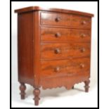 A Victorian 19th century bow front mahogany chest of drawers. Raised on turned legs with 2 short