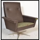 A danish 1970's faux grained leather swivel desk / lounge chair / armchair having tall buttoned