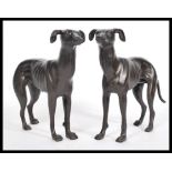 A pair of 20th century antique bronze style statues / figures of greyhounds. Hand painted bronze