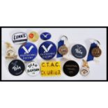 A collection of vintage 20th Century Travel Agents enamel badges, with badges for Polytechnic