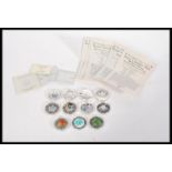 A collection of eleven Royal Canadian mint silver proof coins to include five fine silver .999 in