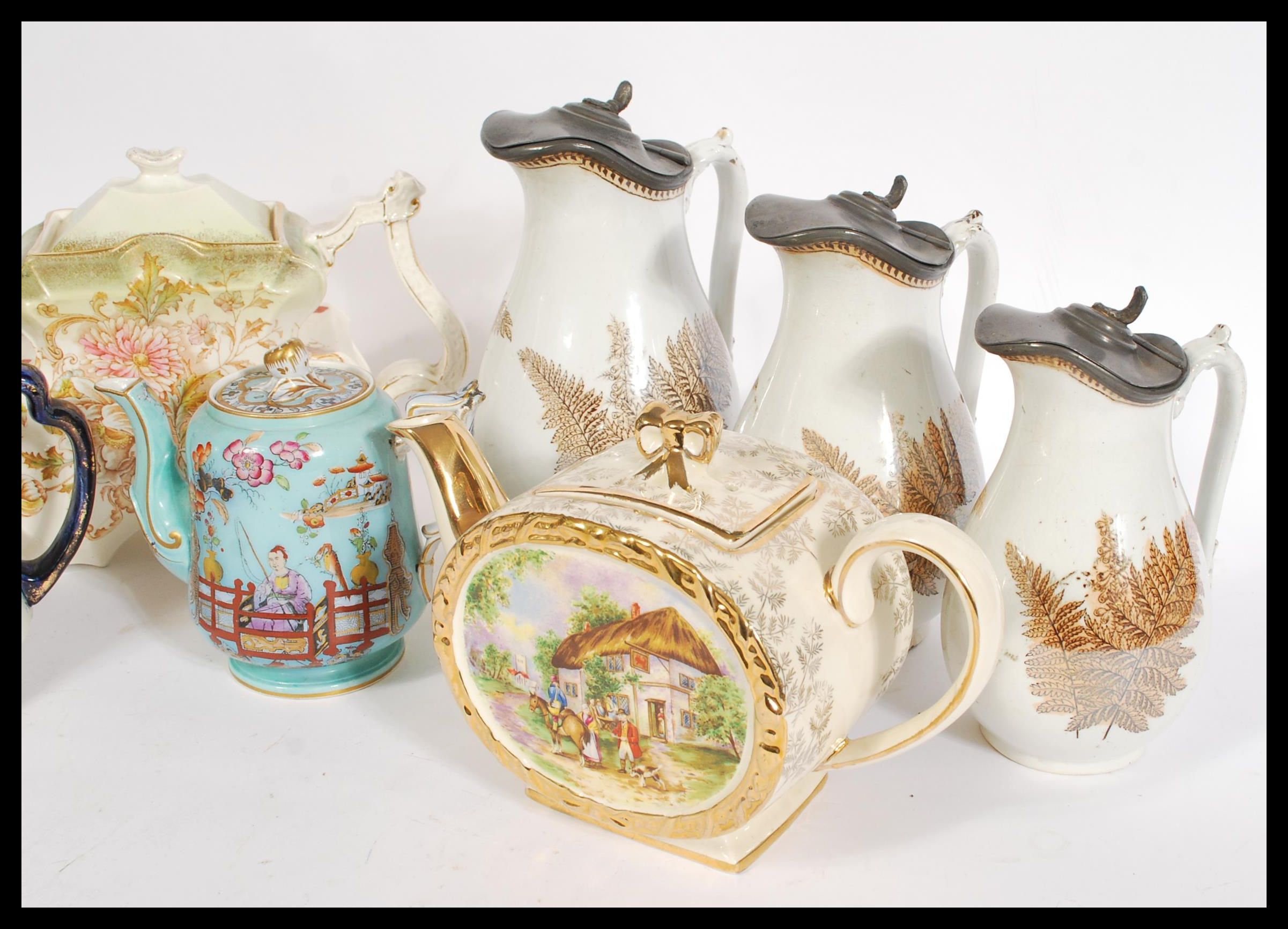 A collection of teapots dating from the 19th Century onwards to include a Victorian teapot of shaped - Image 2 of 6