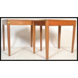 A pair of mid century Air Ministry marked office desks - writing tables in golden oak being raised