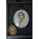 An early 20th Century hand painted watercolour portrait painting miniature depicting a lady in
