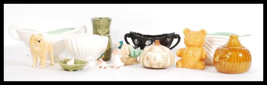 A selection of Sylvac ceramic wares to include a crying onion pot, a figurine of a Chow Chow dog,