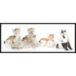 A selection of Lomonosov USSR animal china figurines to include a panda, two tiger cub figurines,
