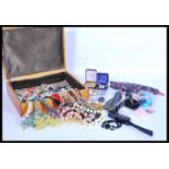 A selection of vintage costume jewellery to include a large selection of beaded necklaces,